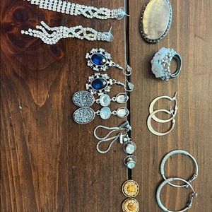 8 pairs of earrings, a broach and ring